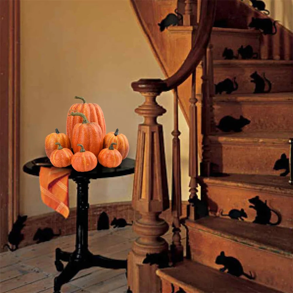 Artificial pumpkins displayed indoors as autumn home decor