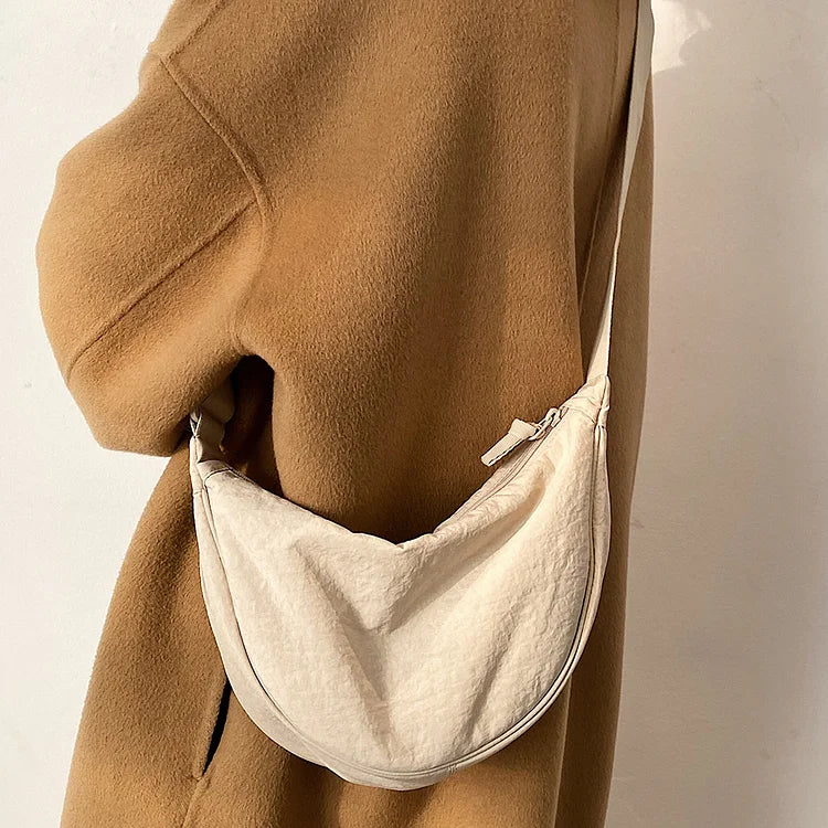 Lightweight Crossbody Bag with One Roomy Compartment | Dumpling Shape Shoulder Sling for Work, Shopping or a Day Out | Eight Colors
