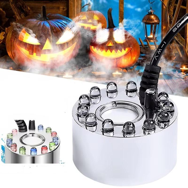 LED water fogger producing colored mist for a decorative display