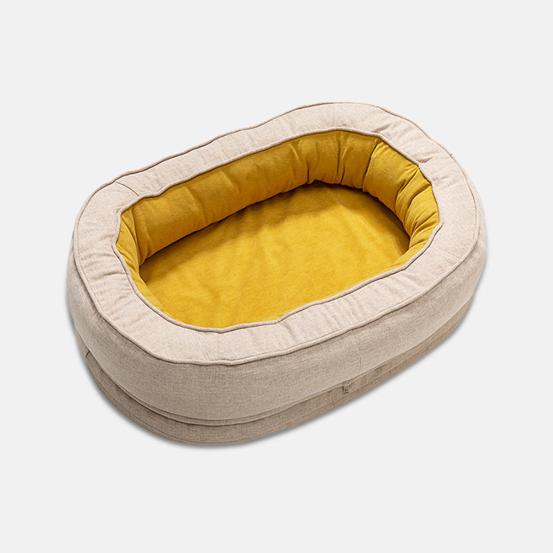 Oval Bolster Dog Bed with Waterproof Inner Layer | Removable Machine Washable Cover | 3 Sizes | 4 Colors