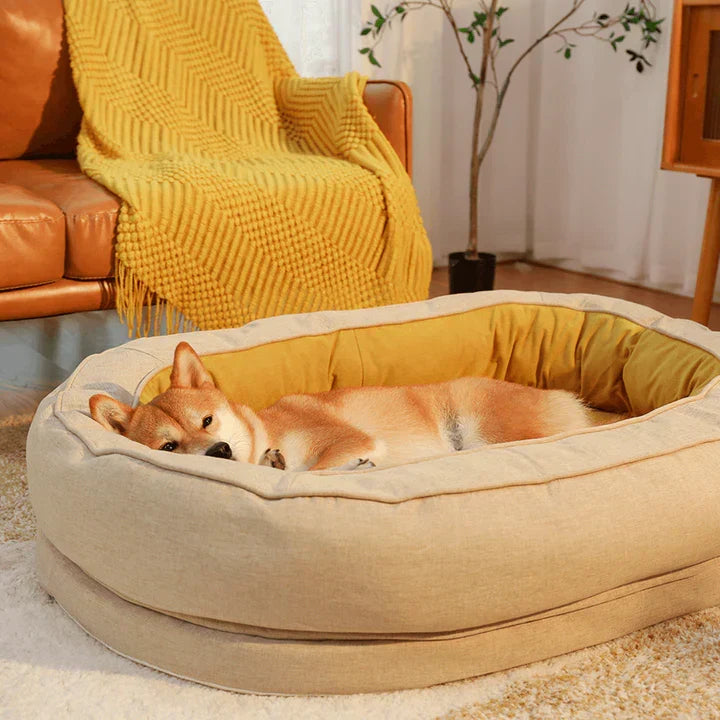 Oval Bolster Dog Bed with Waterproof Inner Layer | Removable Machine Washable Cover | 3 Sizes | 4 Colors