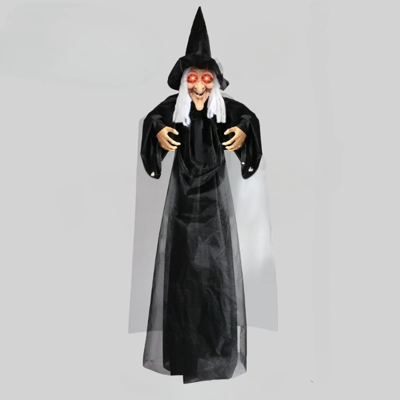 Animated witch decoration in purple costume