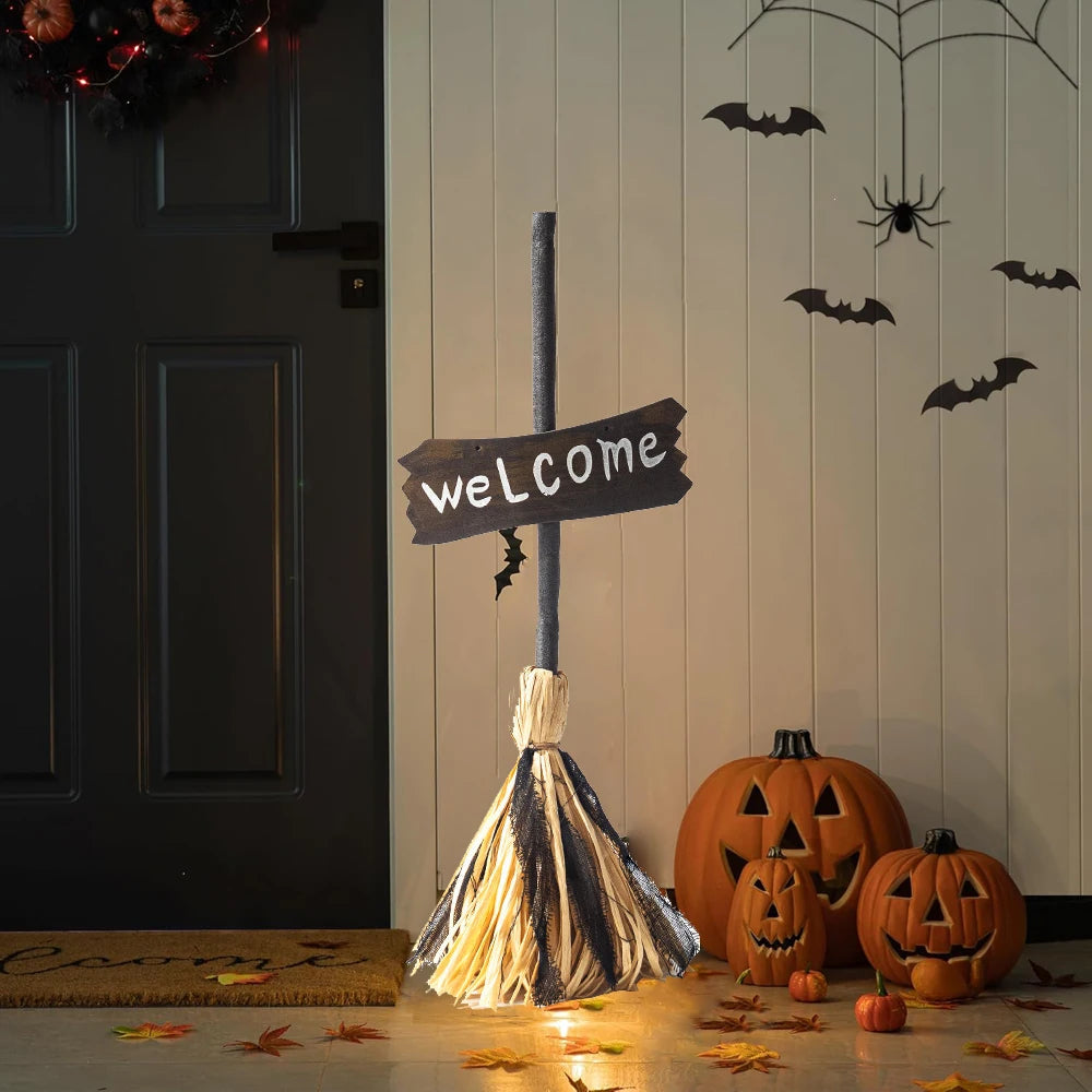 Animated Halloween witch broomstick prop with glowing red lights