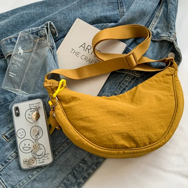 Lightweight Crossbody Bag with One Roomy Compartment | Dumpling Shape Shoulder Sling for Work, Shopping or a Day Out | Eight Colors