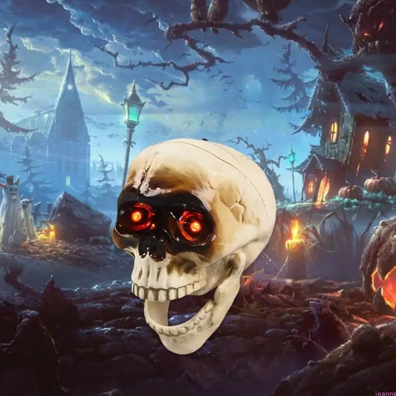 Plastic Halloween skull with moving jaw hung on a door