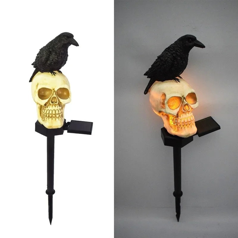 Solar Halloween skeleton head stake light facing ahead and glowing warm white