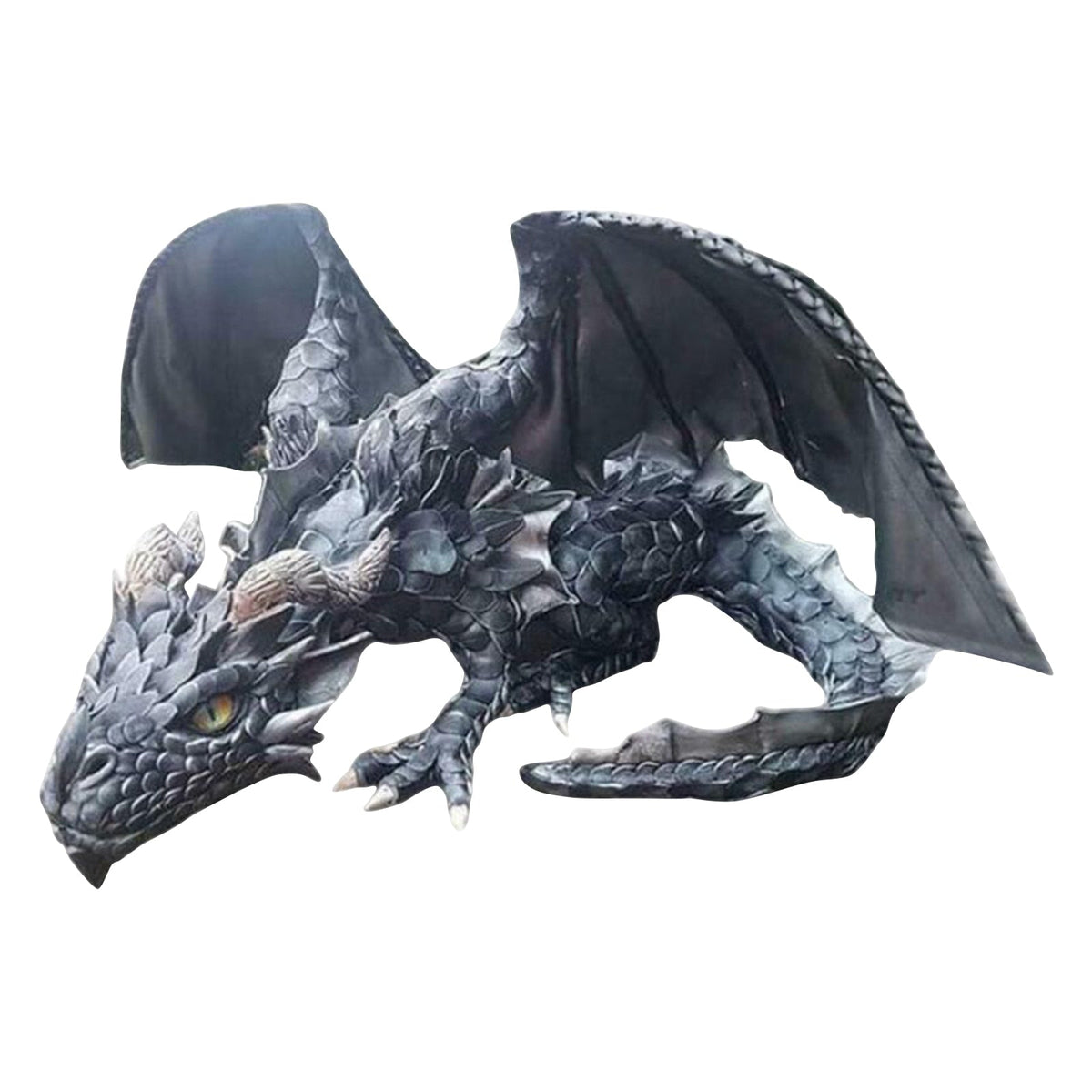 Dragon guardian statue placed outdoors among greenery