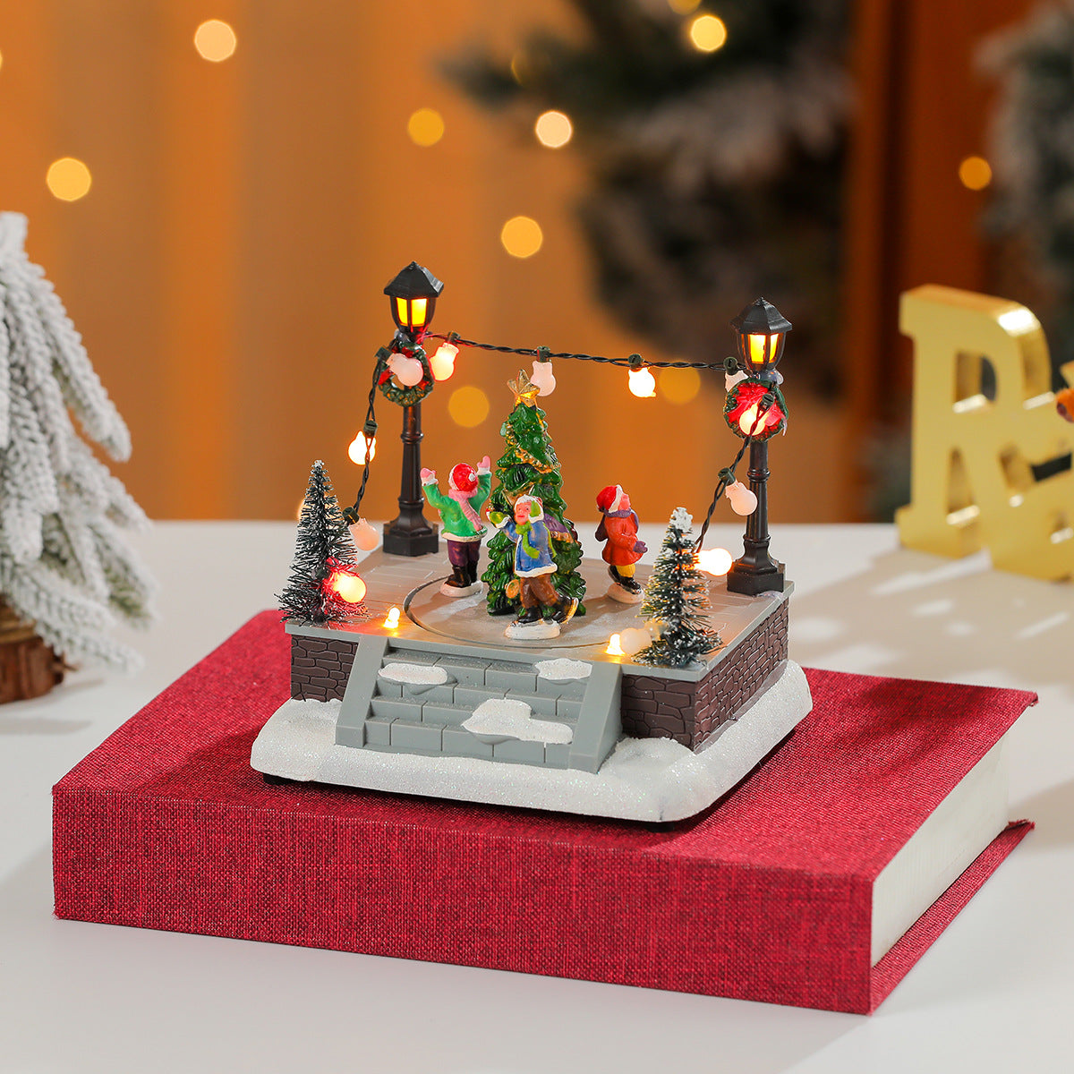 LED Lighted Christmas Town Figurines Skating Scene Set