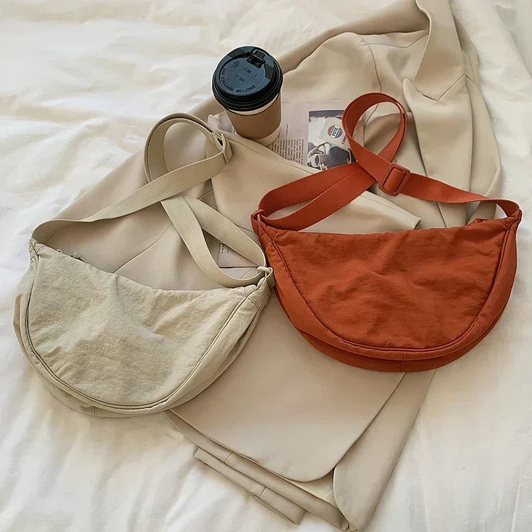 Lightweight Crossbody Bag with One Roomy Compartment | Dumpling Shape Shoulder Sling for Work, Shopping or a Day Out | Eight Colors