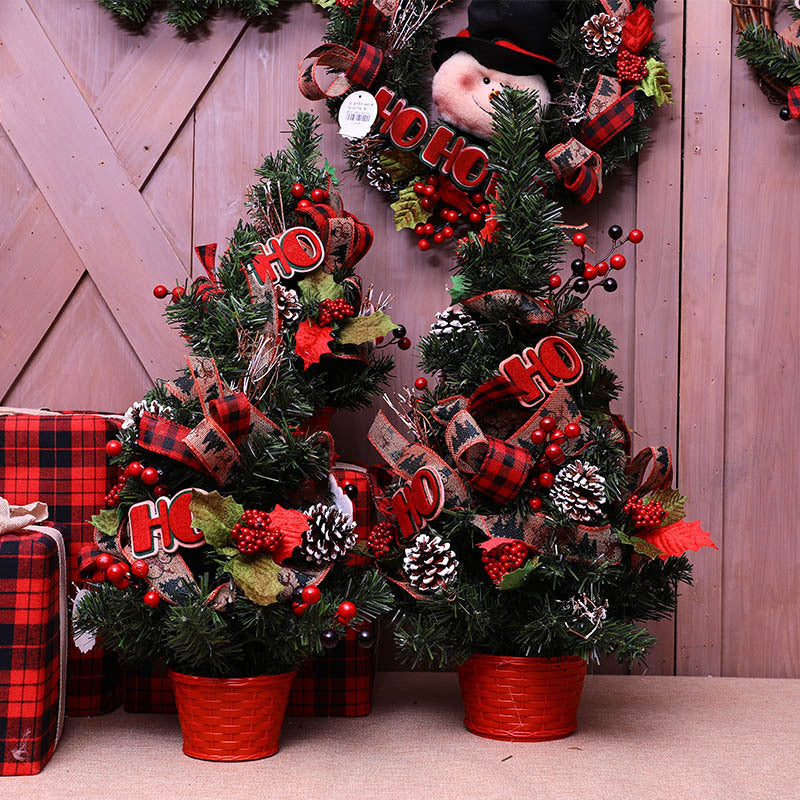 Miniature Christmas Tree with Plaid Ribbon and Red Berries