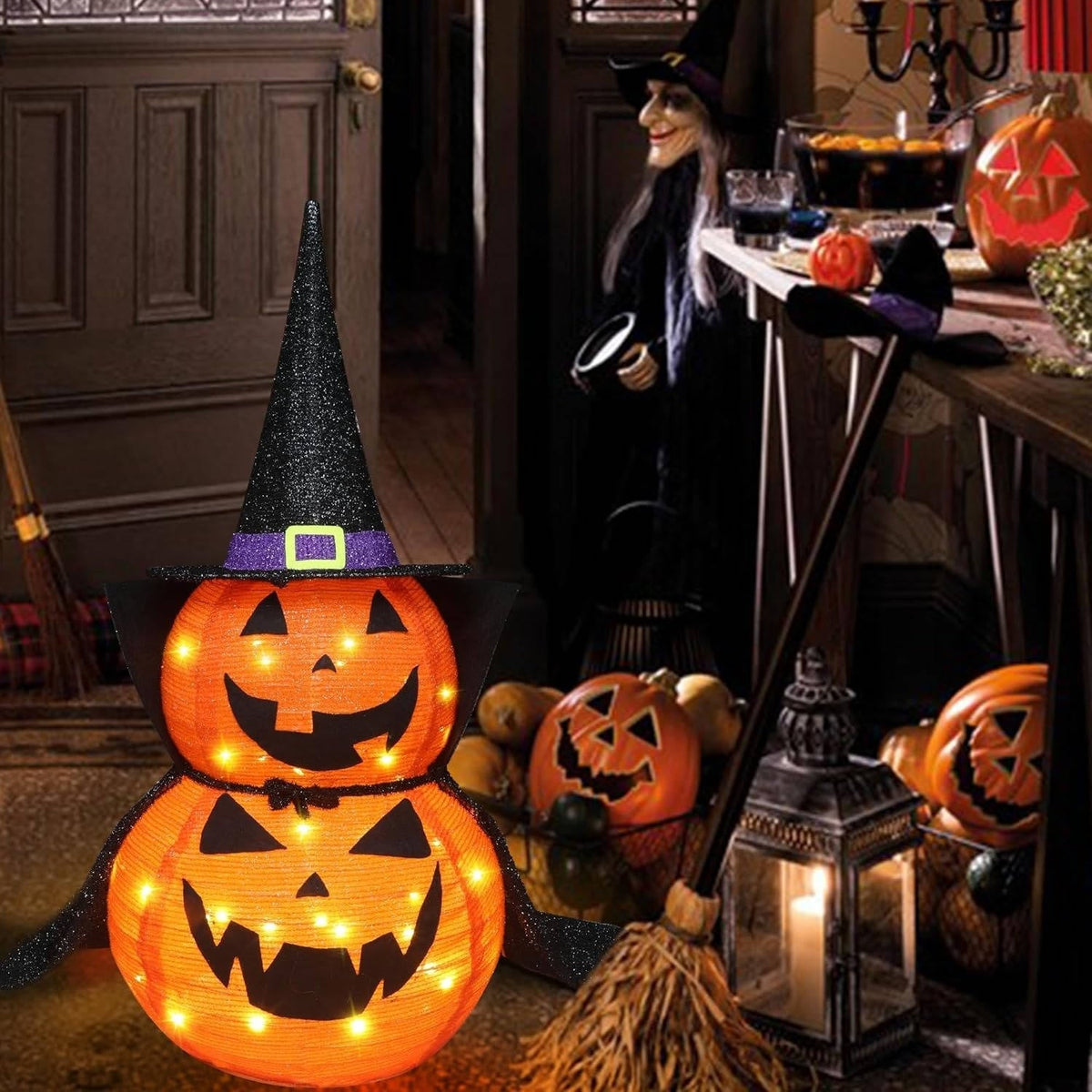 Lighted pumpkin decoration shown with its pointed wizard hat topper